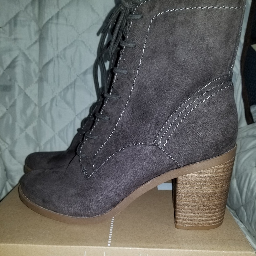 Above Ankles laced up Boots New in box